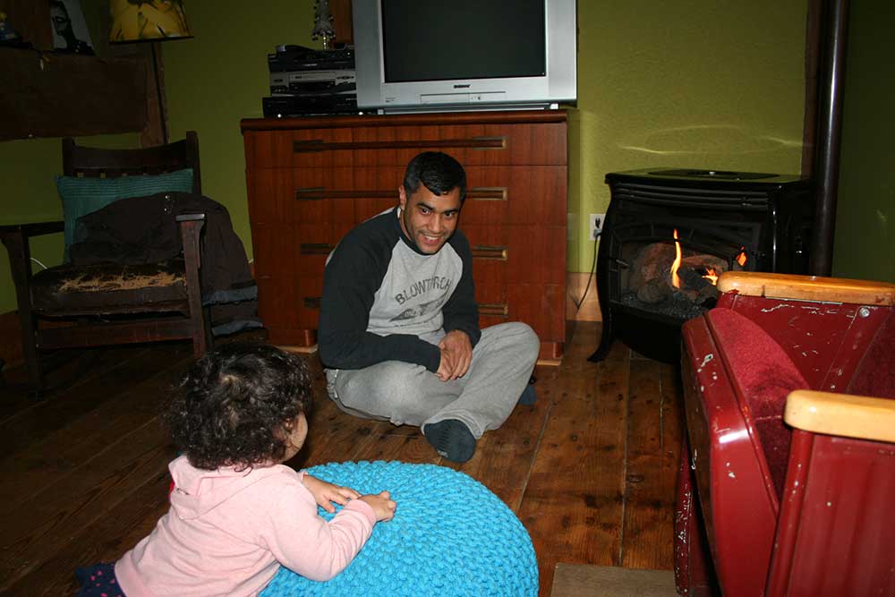 Wood stove glowing in the living room